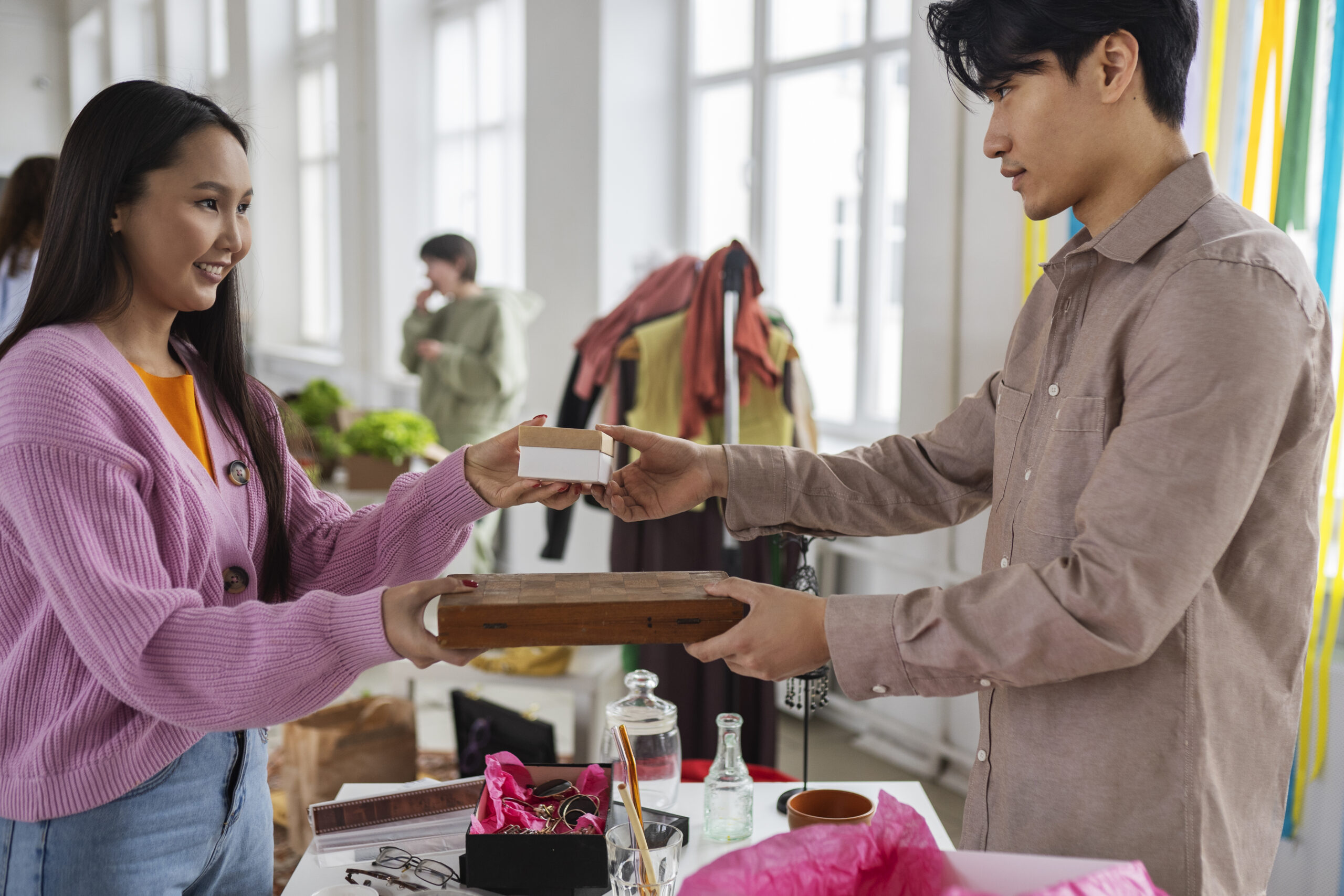 people meeting barter event exchange goods